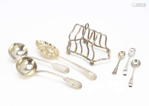 A George V silver toast rack, together with a George III silver berry spoon, two silver sauce