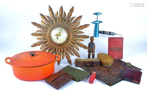 A 20th Century sunburst clock, with Roman numerals and gilt wood sunrays, 45cm x 45cm, together with