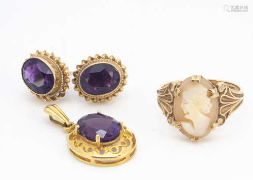 An amethyst 9ct gold drop oval pendant, a pair of 9ct gold and amethyst stud earrings and a shell