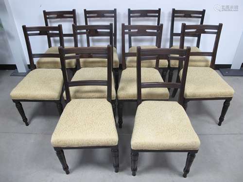 A set of ten late 19th Century mahogany dining chairs, by Jas. Schoolbread and Son, London, reeded