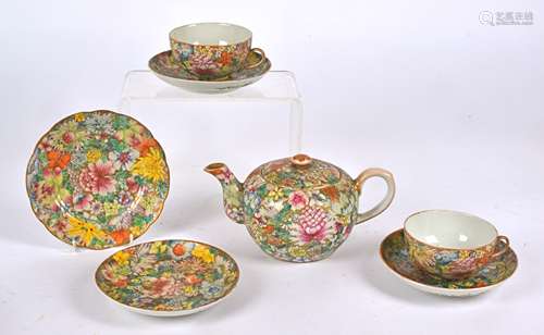 A Chinese Guangxu (1875-1908) part porcelain part tea set of millefiori design, with polychrome