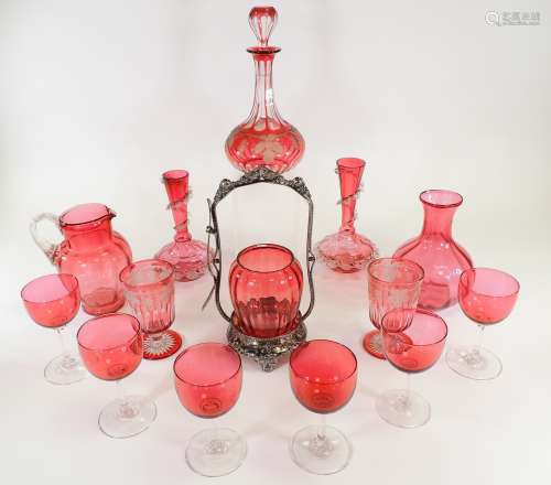 A small quantity of cranberry glass, to include a decanter with grape and vine design, height