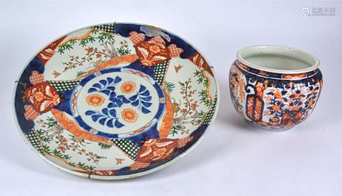 A 19th Century Japanese Imari charger, the central floral medallion surrounded by alternating