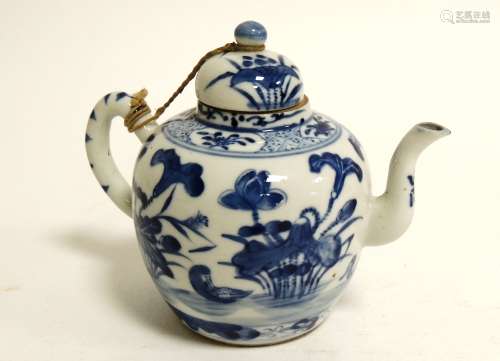 An 18th Century or later underglaze blue and white Chinese export ware teapot, of squat bulbous