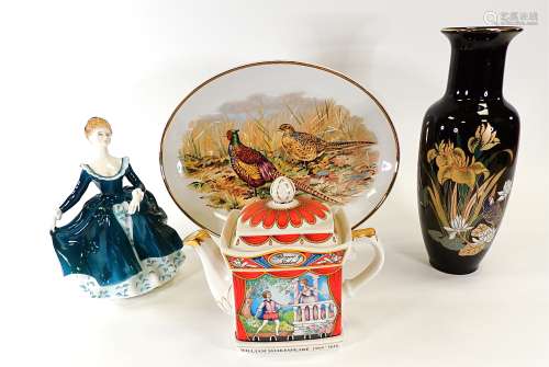 A Sadler teapot in the Romeo and Juliet pattern, height 17cm, together with a Royal Doulton figure
