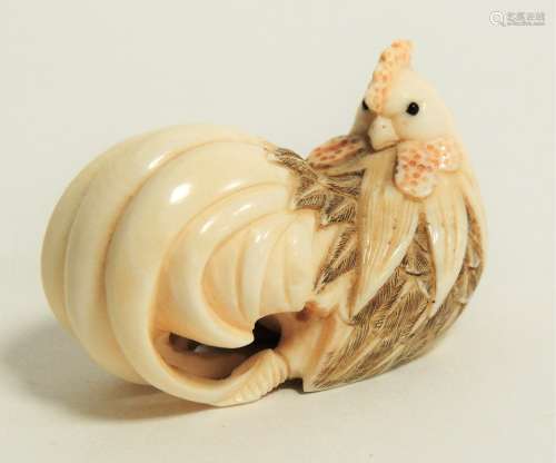 A Japanese Meiji period (1868-1912) or early Taisho (1912 - 1926) ivory netsuke in the form of a