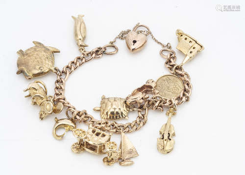 A 9ct gold curb link charm bracelet, with heart shaped engraved padlock clasp, bracelet marked 9ct