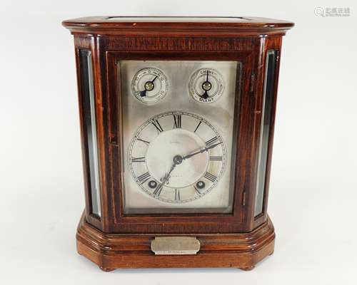 An early 20th Century cased Weir & Son of Dublin clock, with dedication plaque reading 'in