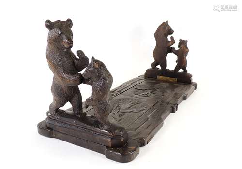 Late 19th-early 20th Century Black Forest book ends, two carved bears on each end and floral