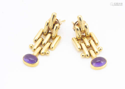A pair of continental yellow metal amethyst drop earrings, the chain links supporting cabochon