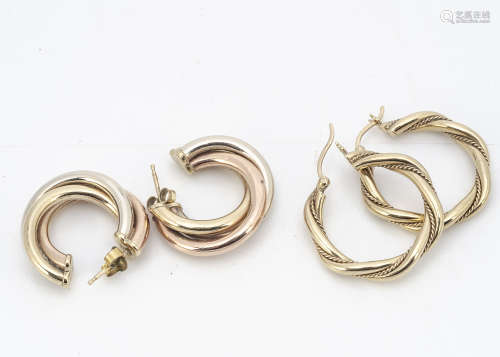 Two pairs of circular gold earrings, one of rope twist design, the other in two colours, 8.5g