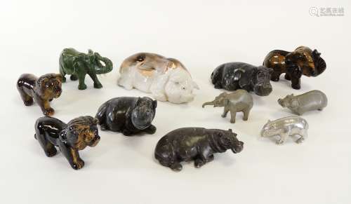 A small collection of hardstone animals, to include tigers eye elephant and lions, together with