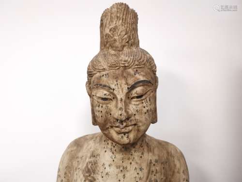 An instructional Chinese wooden acupuncture figure of life sized female proportions, probably
