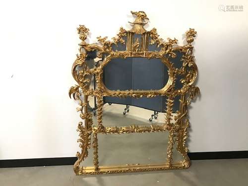 A modern Chinoiserie style gilt wall mirror, some damage to gilding and cracks, 150cm high x 120cm