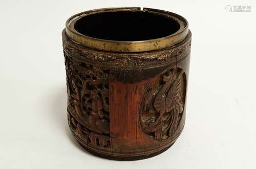 A Chinese bamboo pot, with a carving of dignitary and attendants and two carved circular panels of