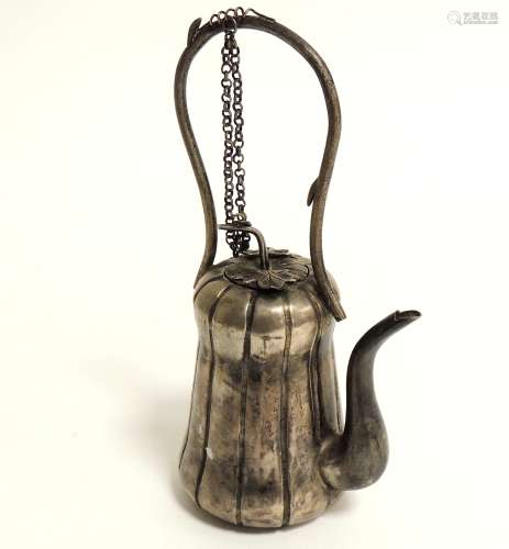 A white metal teapot in the form of a gourd, height 16.5cm