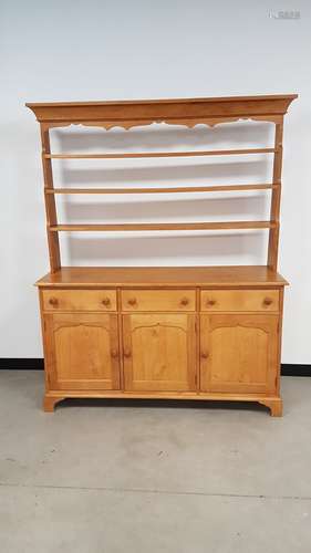 A contemporary oak dresser base and top by Alan Solly of Marlborough Wilts, with fitted base, with