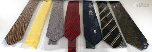 A quantity of branded ties, all contained in individual cellophane wrappers, labels read Giorgio