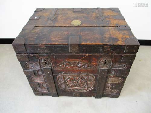 An antique elm silver strong box, carved front panel, metal bound body, double lock, inner drop in