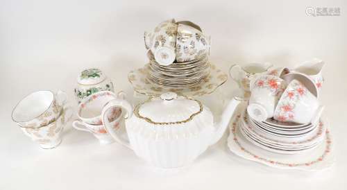 An eight piece Derby porcelain part tea set, of fluted form, decorated in gilt, the base with