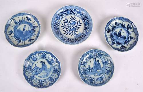 Five Chinese export dishes with blue and white decoration, four floriform dishes with concentric