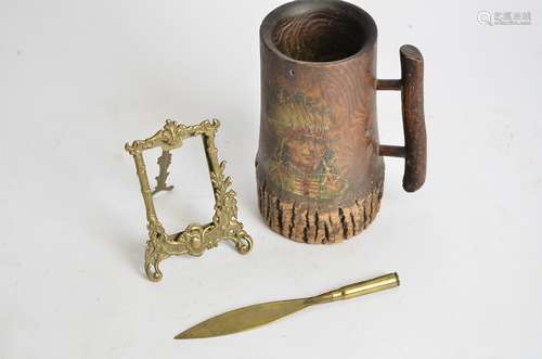 A WW1 trench art brass letter opener, together with a frame and native Indian tankard, height