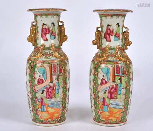 A pair of 19th Century Chinese Canton rose medallion baluster vases, decorated in overglaze