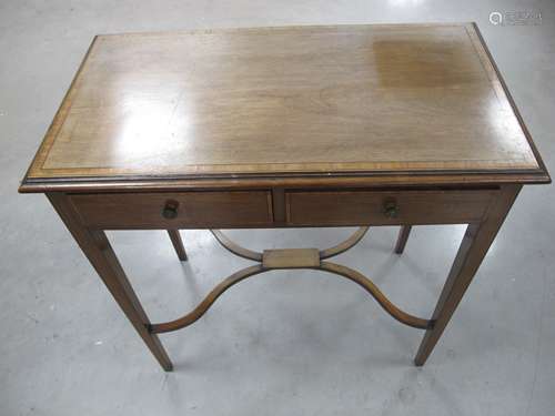 An Edwardian inlaid side table, moulded top with cross banding and stringing, two short frieze