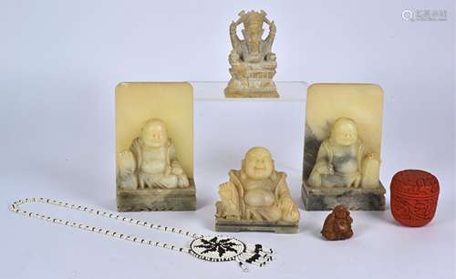 A pair of 20th Century Chinese alabaster or hardstone bookends taking the form of Buddha, height