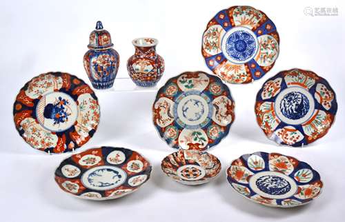 A small collection of Imari ware, to include a pair of dishes with central flying bird design,