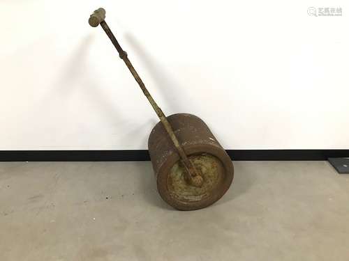 A vintage cast iron garden roller, drum measures 45cm wide