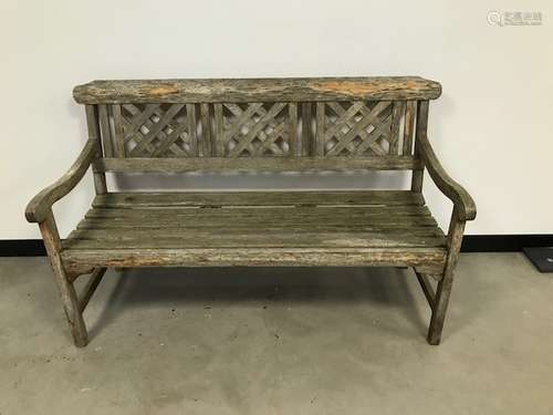 A modern garden bench, from Robert Dyas, probably teak, 138cm wide