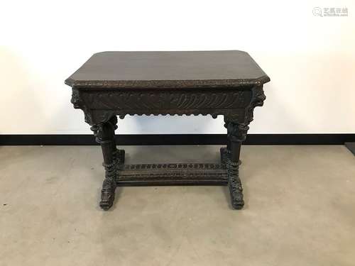 A Victorian carved side table, rectangular with frieze drawer and nicely carved with lion head