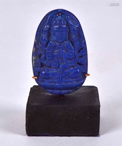 An oval shaped Lapis Lazuli block mounted on contemporary stand, in the form of an Eastern deity,