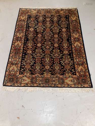 Old Middle Eastern Rug, a bordered example with overall geometric and stylised floral detail on a