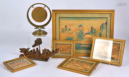 A small group of Asian works including a wooden carving of figures in a chilong shaped boat,