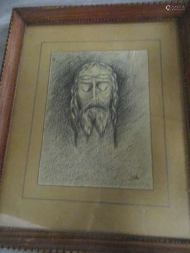 An early 20th Century pencil drawing of Christ, with indistinct initials to lower right, framed,