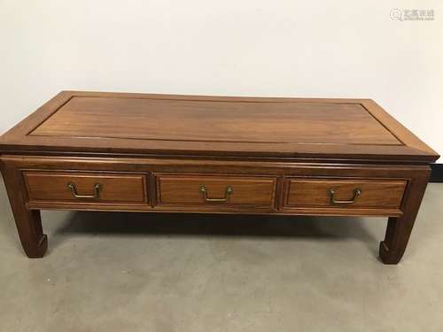 A modern teak Chinese influence coffee table by Brights of Nettlebed, with three drawers, 122cm