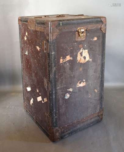 The Winship Wardrobe Trunk, early 20th Century, leather studded with corner mounts, 56 x 64 cms, 100