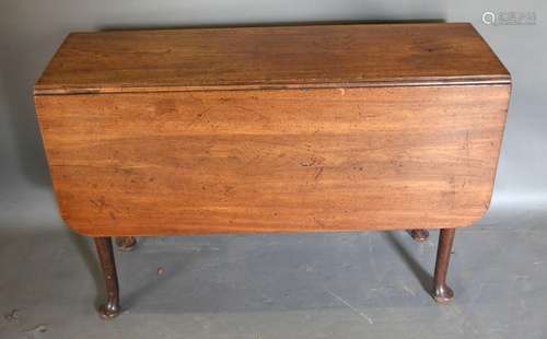 A Early 19th Century Drop Flap Dining Table the turned tapering legs with pad feet 112cm x 107cm,