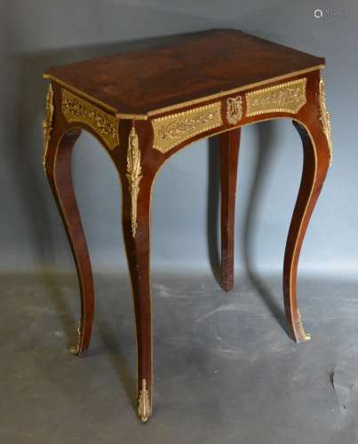 A French Style Marquetry Inlaid and Gilt Metal Mounted Side Table, the inlaid top above a relief