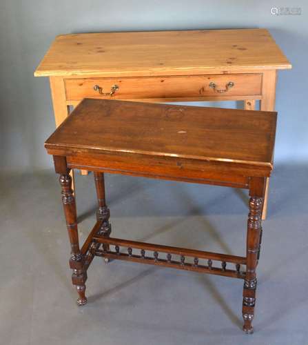 A Pine Side Table with a frieze drawer raised upon square tapering legs together with an Edwardian