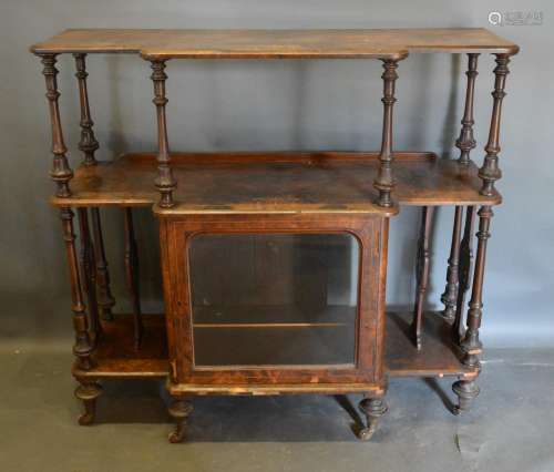 A Victorian Burr Walnut and Marquetry Inlaid Breakfront Canterbury Whatnot with a central glazed