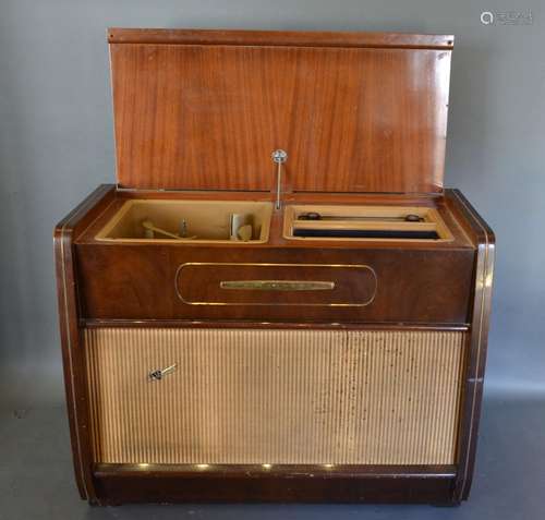 A Regentone Walnut Cased Radiogram, 103cm wide, 47cm deep, 80cm high together with Kodatoy projector