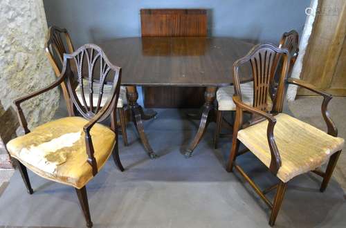 A Reproduction Mahogany Twin End Dining Table with extra leaf together with a set of three 19th