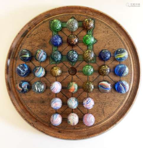 A Collection of Victorian Marbles complete with Solitaire board and an early Ludo box