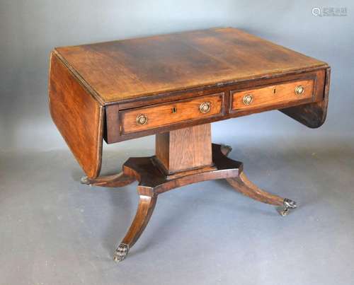 A Regency Rosewood Brass Inlaid Sofa Table, the two frieze drawers opposed by dummy drawers with