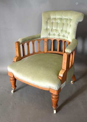 A Late Victorian Walnut and Marquetry inlaid Drawing Room Armchair, the buttoned upholstered back