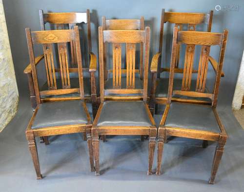 A Set of Six Early 20th Century Oak Dining Chairs comprising two arms and four singles each with