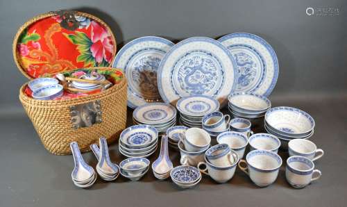 A Collection of Chinese Rice Pattern Ceramics to include cups and saucers, plates and a teapot
